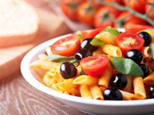 Pasta with fresh vegetables and olives